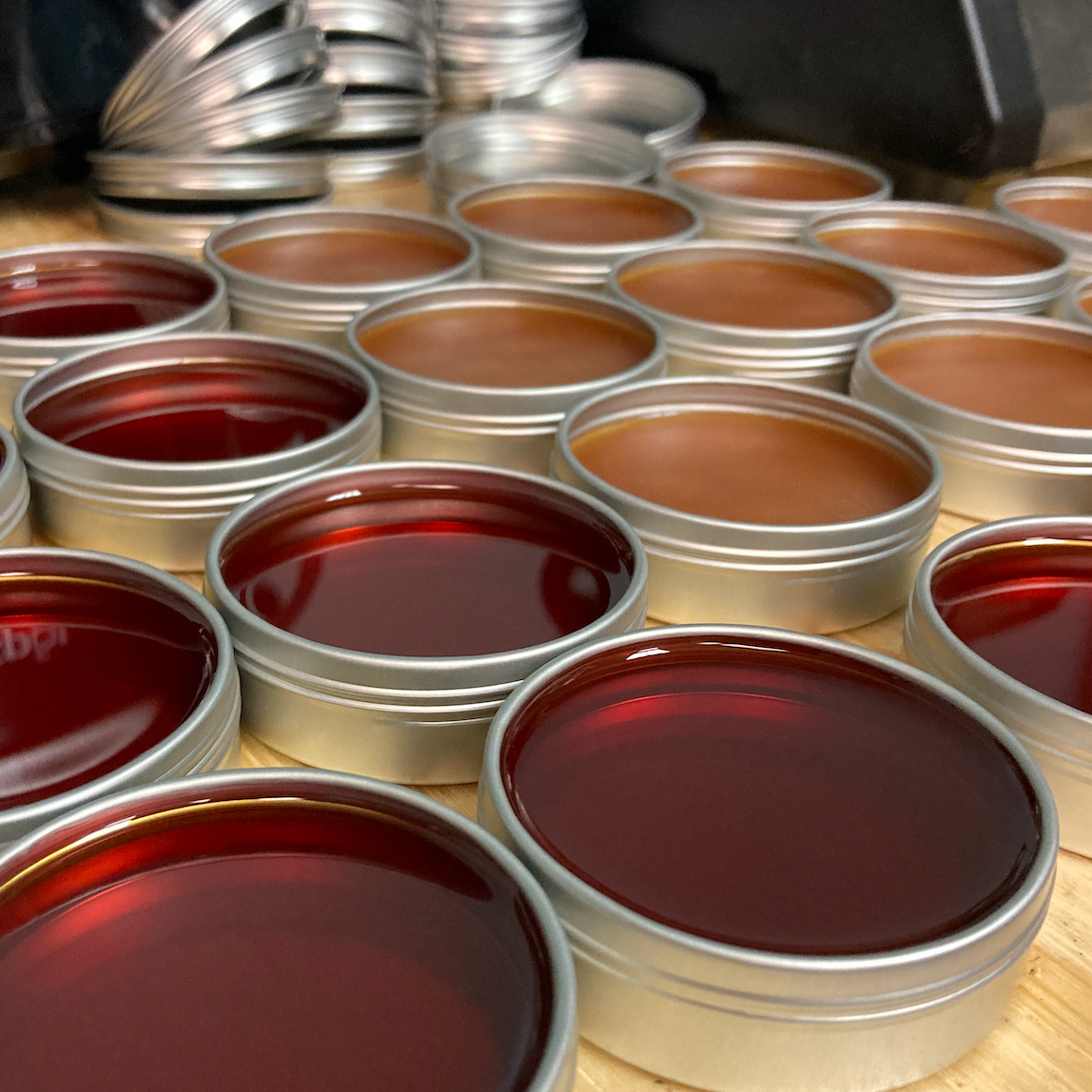 Dandelion Warming muscle rub in containers freshly poured and hardening